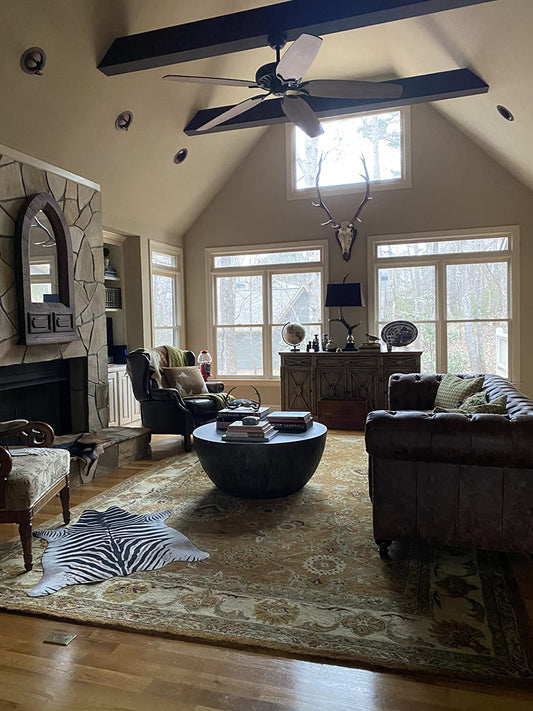 How to Lay an Area Rug Over Carpet