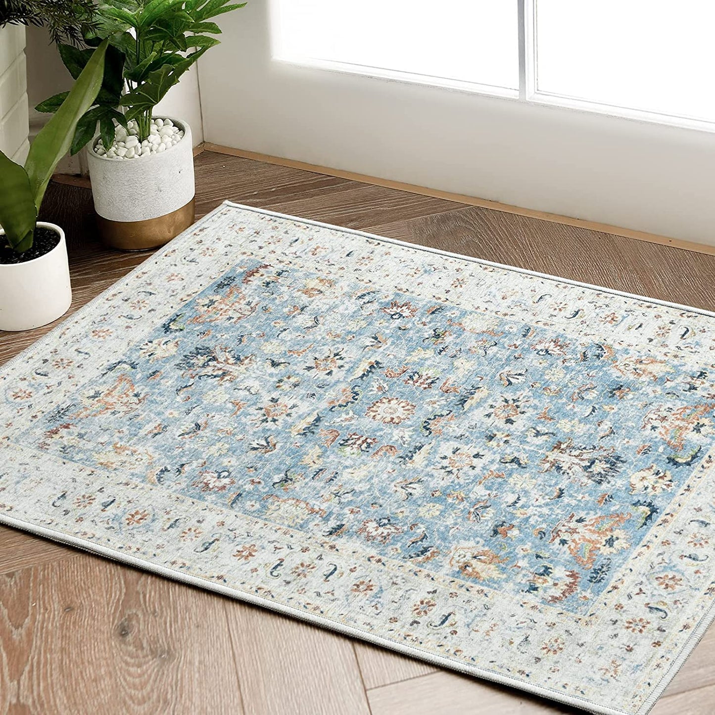 Jinchan Floral Distressed Vintage Blue Foldable Area Rug