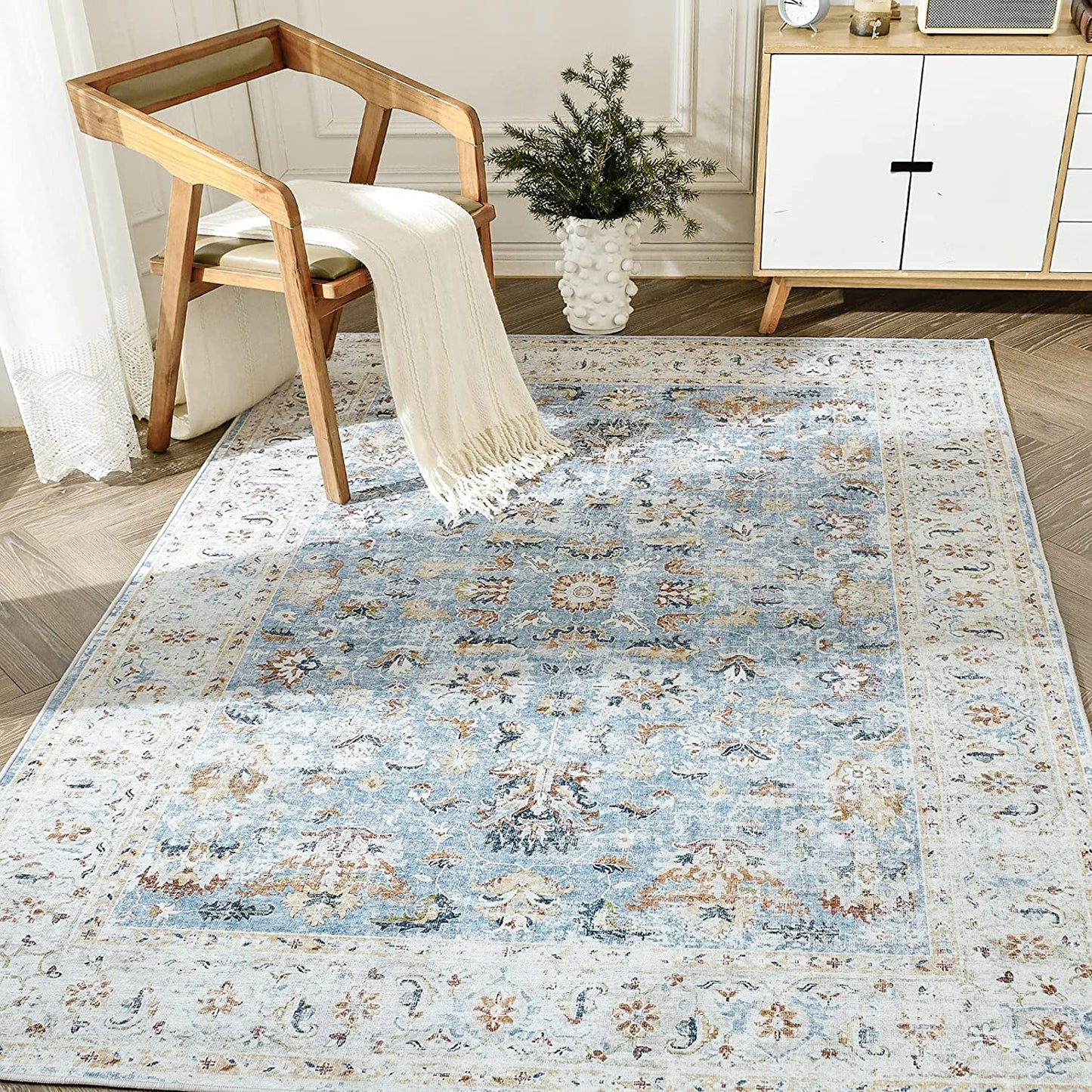 Jinchan Floral Distressed Vintage Blue Foldable Area Rug